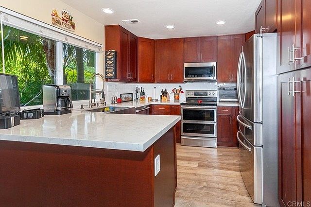 updated kitchen with quartz counters