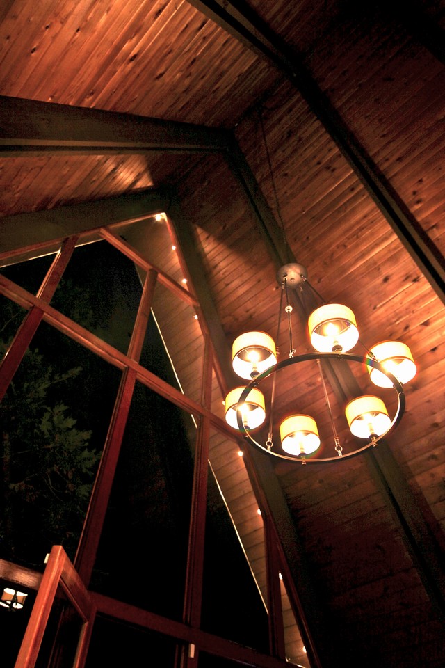 view of ceiling detail & new chandelier