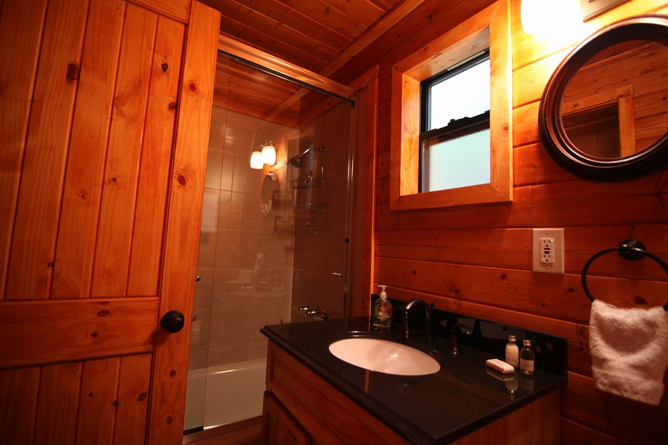 bathroom with new clear glass shower door