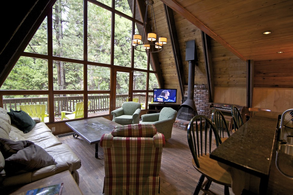 family room with floor to ceiling glass