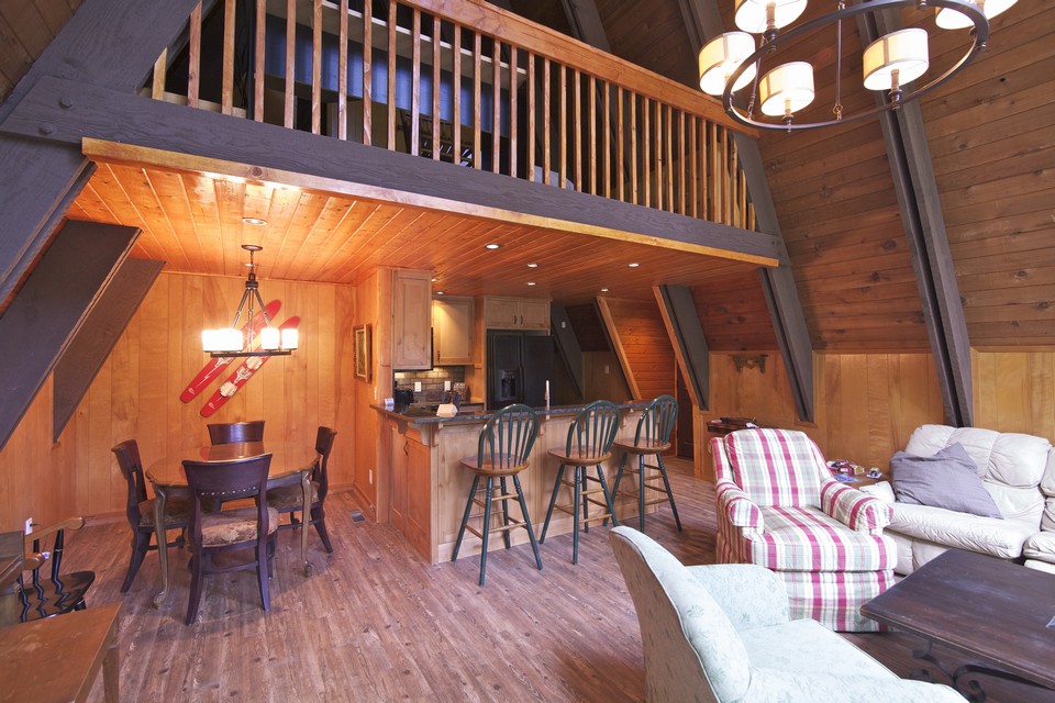 family room with view of dining room and kitchen