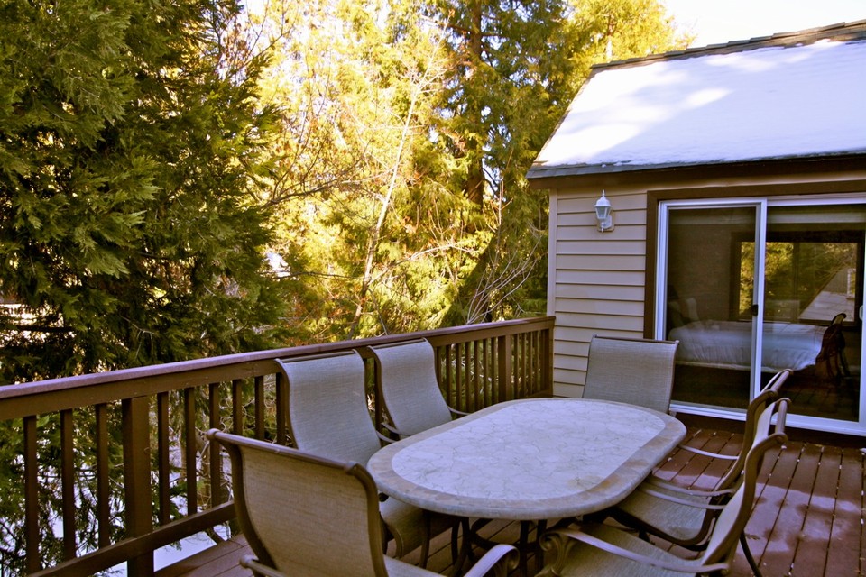 main deck with master bedroom slider in background