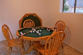 game room downstairs with outside access