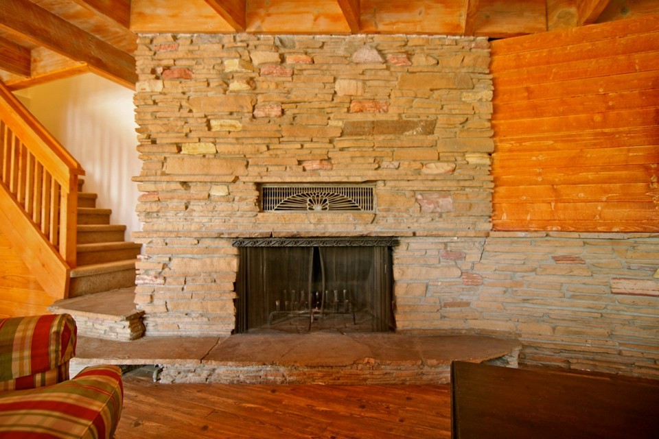 original stacked stone fireplace