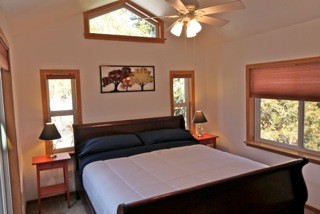 nice master bedroom with lots of light - slider leads to main deck