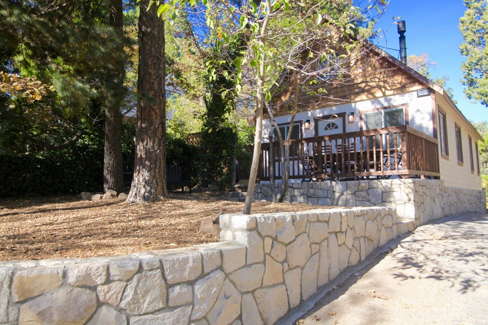 view from the street - custom stone retaining wall