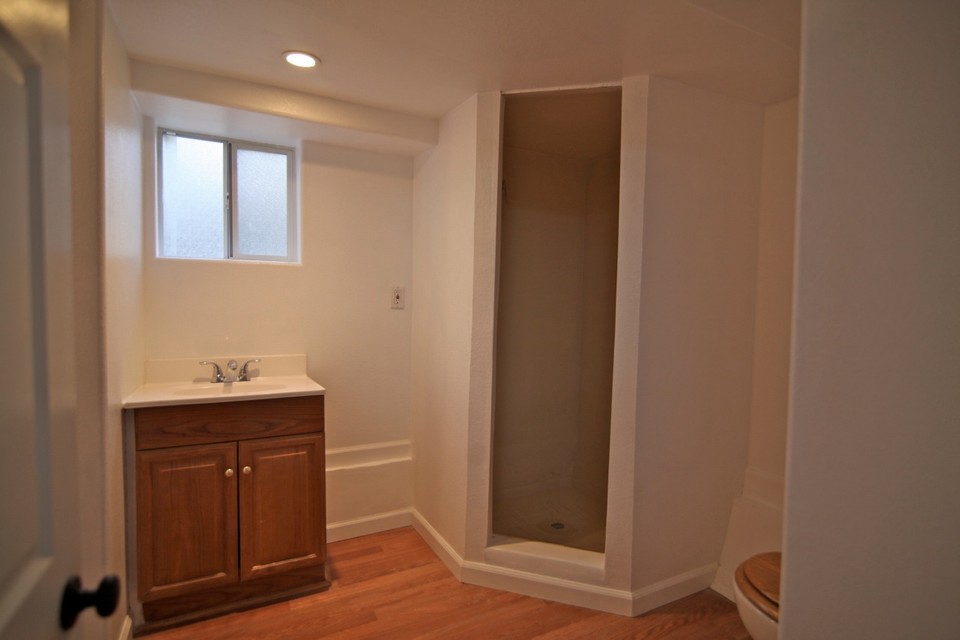 garage 3/4 bathroom next to laundry area